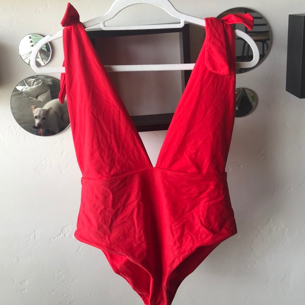 Low cut high rise one piece bathing suit